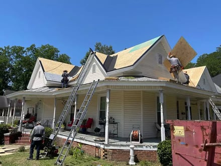 A completed roof replacement on a home