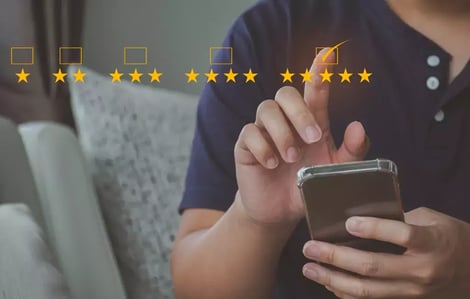 A person selecting a 5-star review_WebP