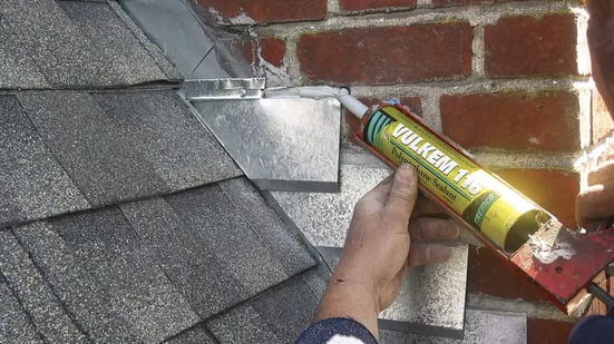 Caulking around chimney flashing