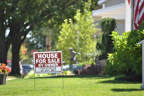 A house for sale with a well-kept roof