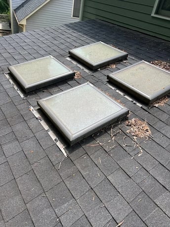 Skylight installed on an asphalt shingle roof