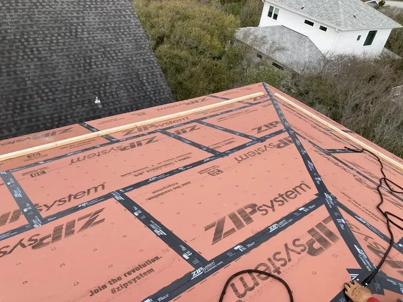 Roof deck panel seams sealed with flashing tape on a FORTIFIED roof installation in North Carolina