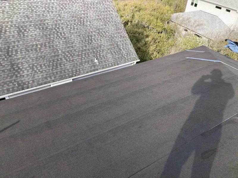 Self-adhered peel-and-stick underlayment membrane covering an entire roof deck on a FORTIFIED installation