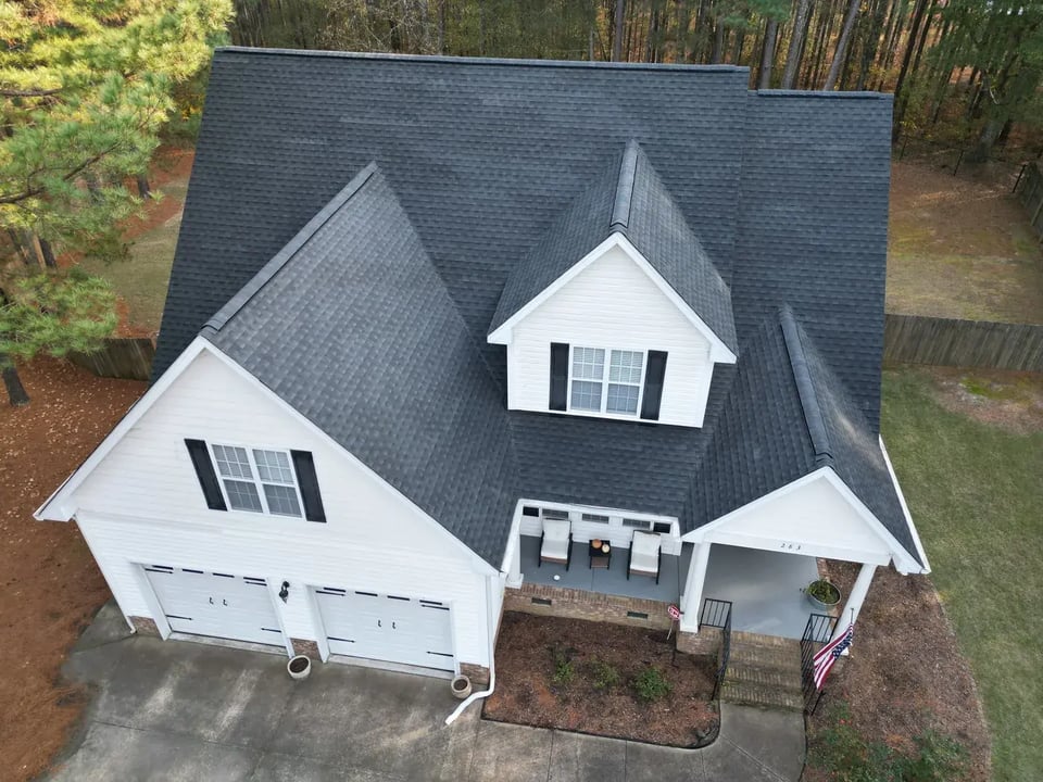 Aerial view of a completed roof inspection and replacement project on Thicket Dr in Angier, NC