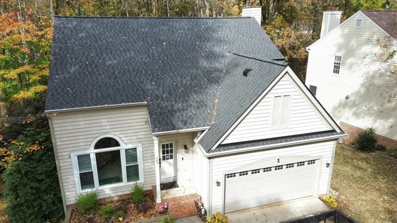 Appalachian Sky GAF HDZ shingles on a cream two-story home in Cary