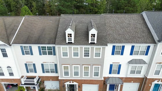Weathered Wood GAF HDZ shingles on white vinyl townhomes in Cary