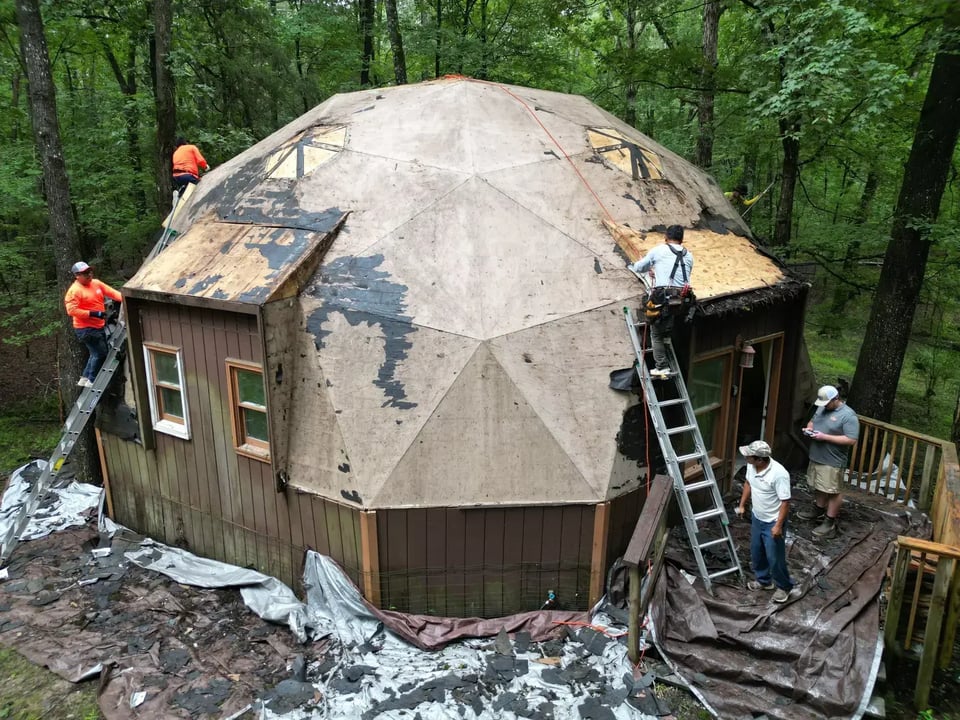 On Tops Roofing crew installing new shingles on a Chapel Hill home on Hawk Ridge Rd with safety equipment and staging