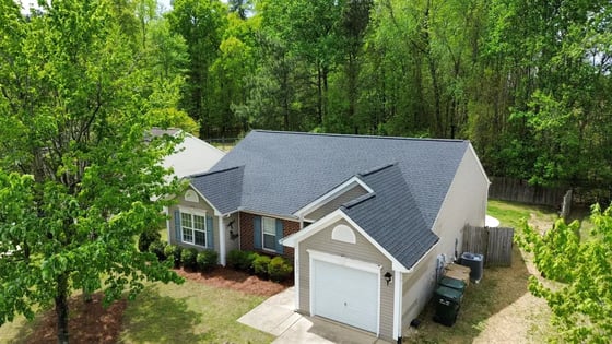 Charcoal GAF Timberline Natural Shadow shingles on a home on Day Flower Dr in Clayton