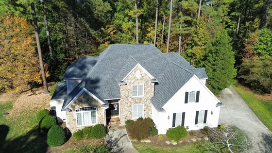 Pewter Gray GAF UHDZ shingle roof replacement on a large Durham home on Shadow Moss Pl