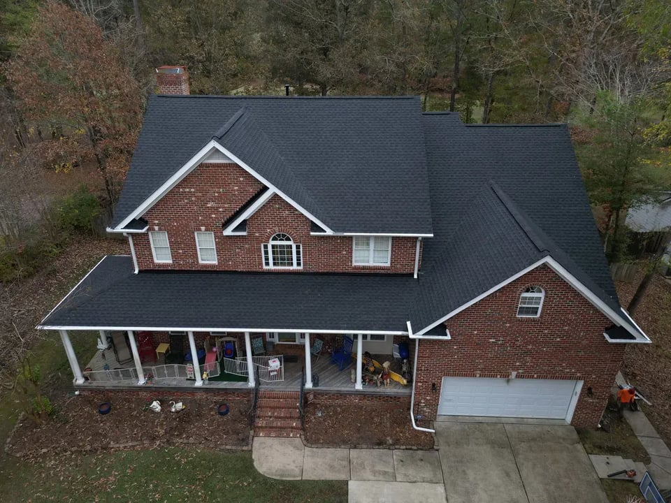 Completed roof replacement on a Lillington home on Keith Hills Rd with new GAF Timberline HDZ Charcoal architectural shingles