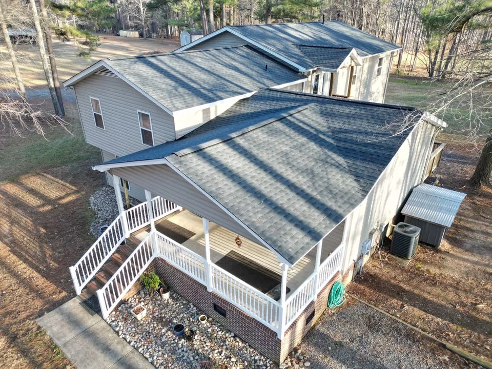 Aerial view of a completed roof inspection and replacement project on Deep River Rd in Sanford, NC