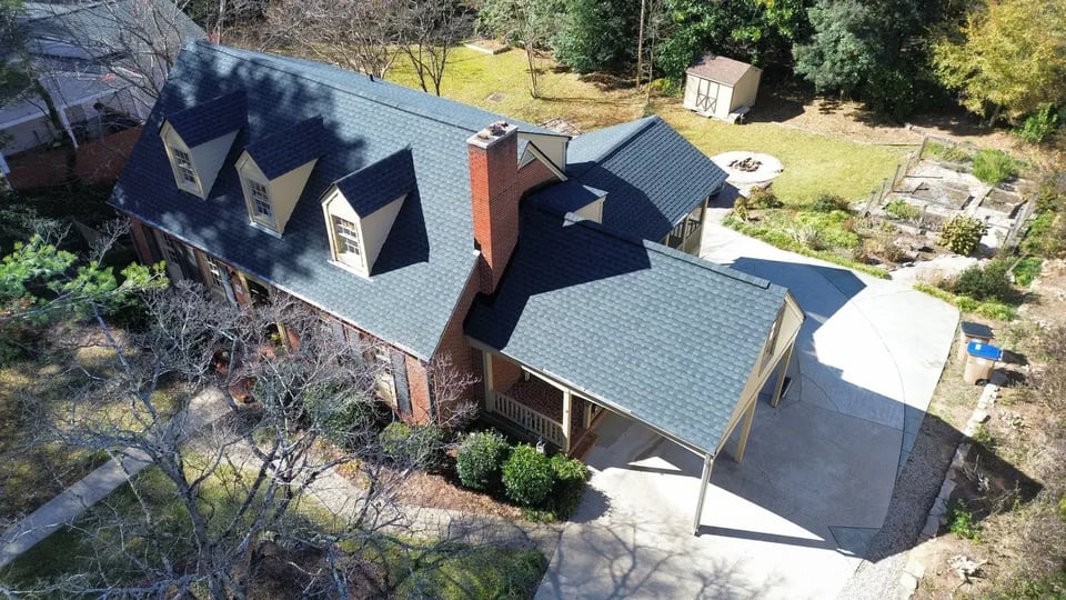 Aerial view of a completed roof inspection and replacement project on N Main St in Wake Forest, NC