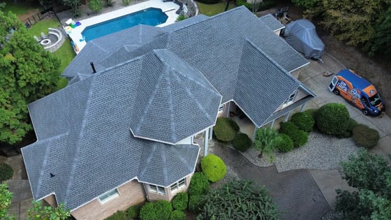 Pewter Gray GAF Timberline Ultra HDZ shingles on a large home on Vista Dell Lago Ln in Wake Forest