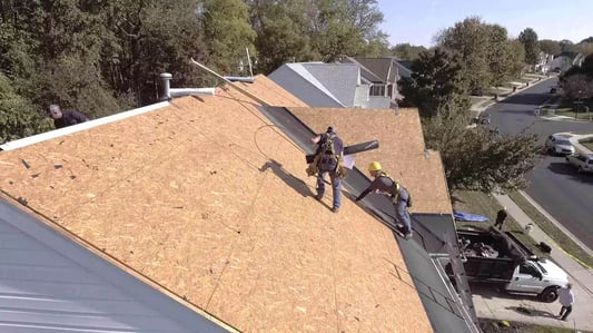 Clean, exposed roof decking during a replacement