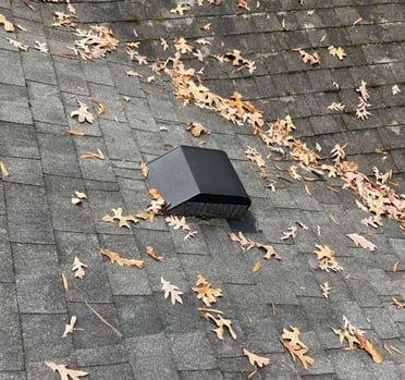 Box vent, also known as a roof louver, on an asphalt roof