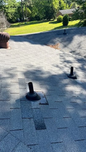Close-up of a common roof leak source on a shingle roof