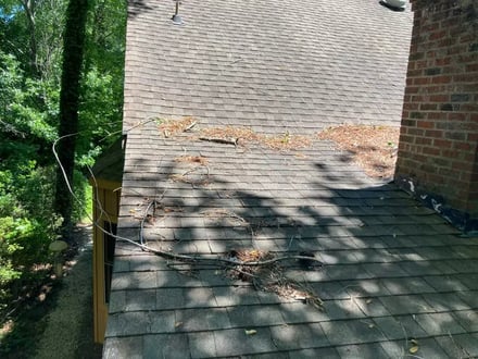 Storm debris damage on a roof