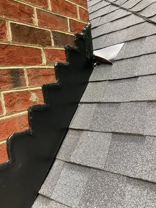 Metal flashing installed on a roof