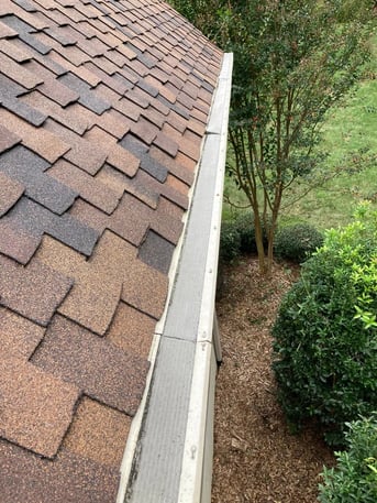 Gutter guards installed on a residential gutter to keep debris out