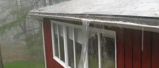 gutters overflowing during heavy rain