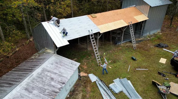 A metal roof being installed