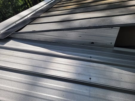 A close-up of a finished metal roof
