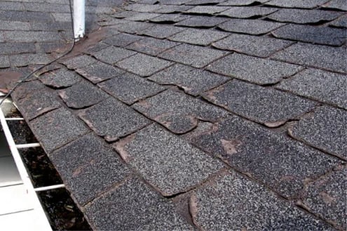An old worn asphalt roof