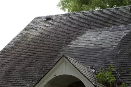 patched and damaged shingles