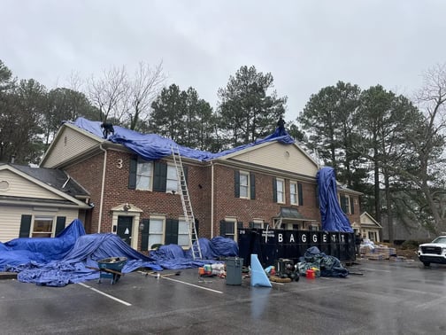 Rain beading on roofing underlayment during a replacement