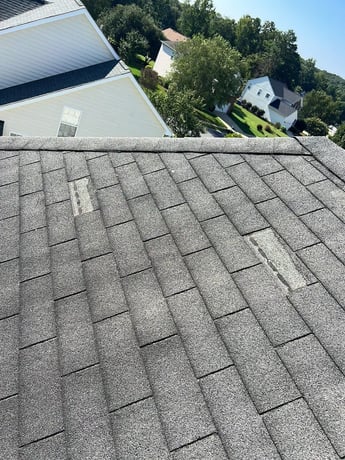 Improperly nailed asphalt shingles