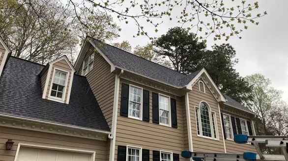 Rain falling on a residential roof