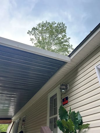 Soffit and fascia along the edge of a roof