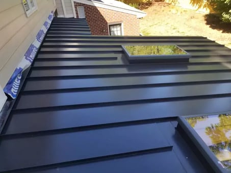 A section of a standing seam metal roof