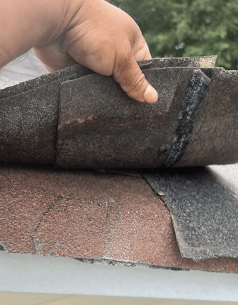 A roof with two layers of shingles
