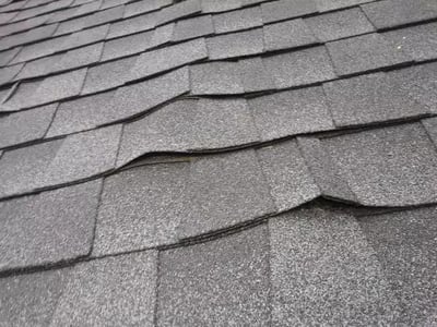 warped shingle installations