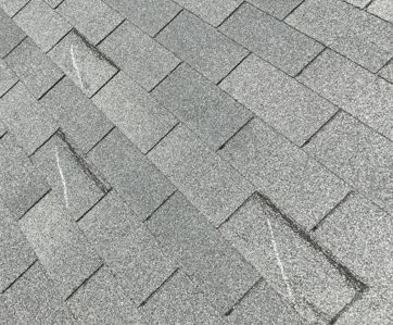 wind damaged shingles