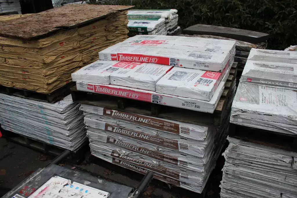 A stack of assorted roofing shingles