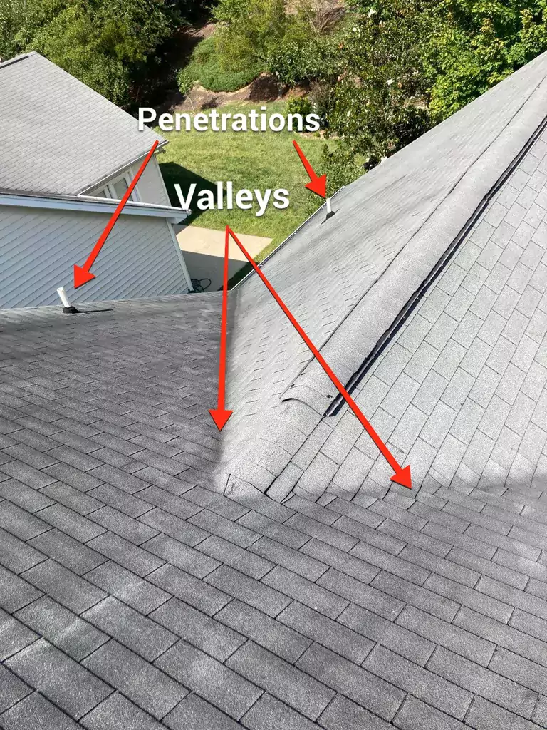 A complex roof with many valleys and penetrations