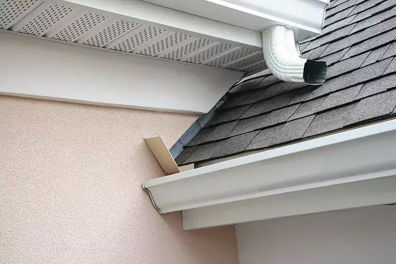 Flashing against the gutters of a home