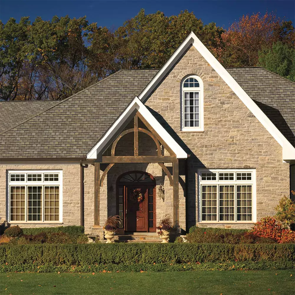 Luxury asphalt shingles that mimic wood shake