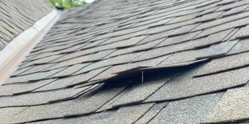 nail popping out of roofing shingles