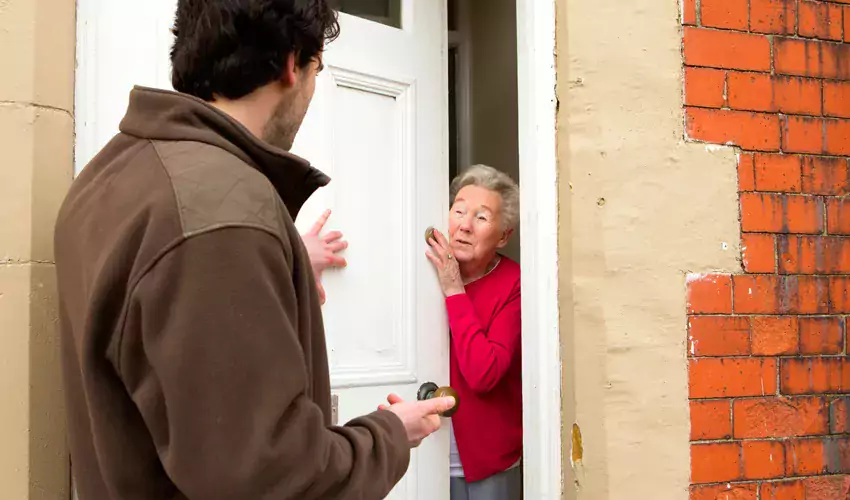 A roofing scam artist attempts to scare an older woman into a bad scheme.