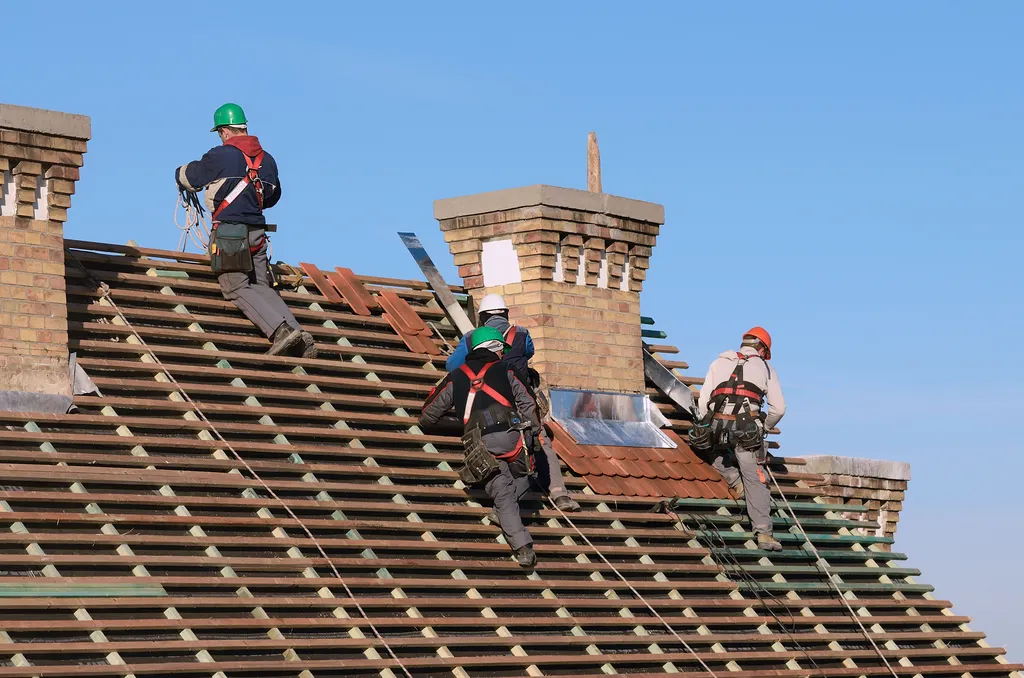 roofing contractors working on a roof replacement_WebP