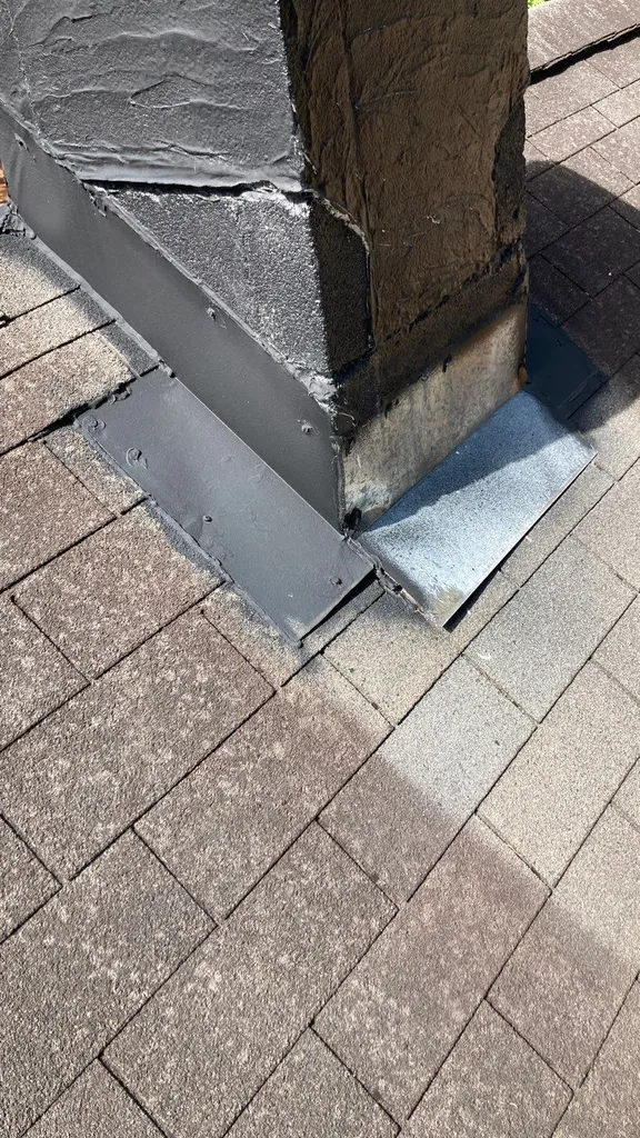 Aging, reused flashing on a roof