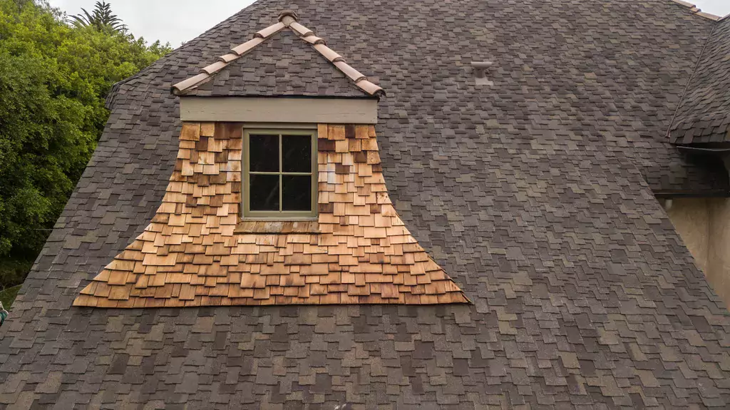 A house with a wood shake roof