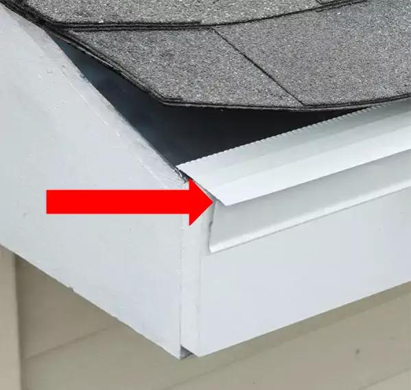 red arrow pointing to the drip edge on a roof