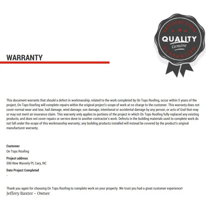 Roof shingle manufacturer warranty paperwork on a desk